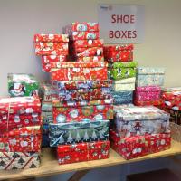 Shoeboxes waiting to be sorted